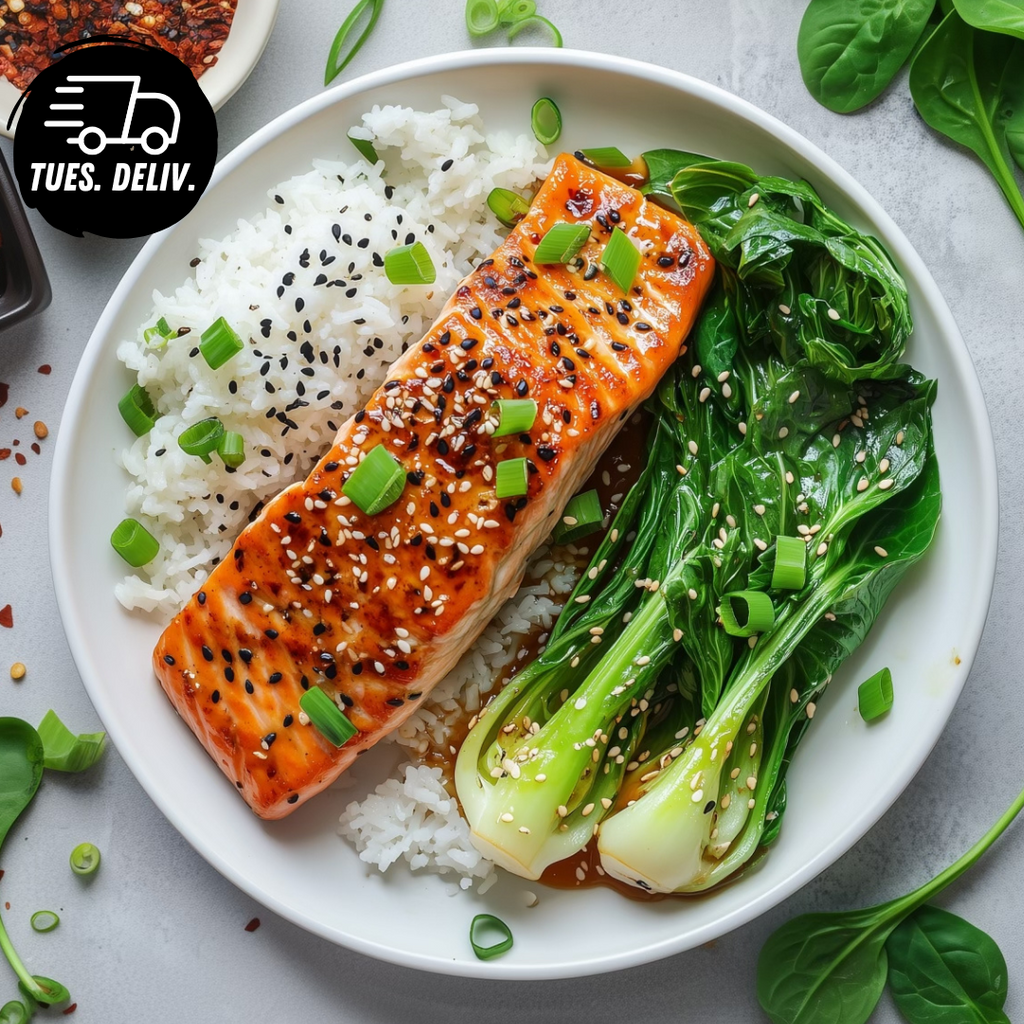 SESAME CRUSTED SALMON WITH GINGER SOY GLAZE AND GARLIC BOK CHOY.