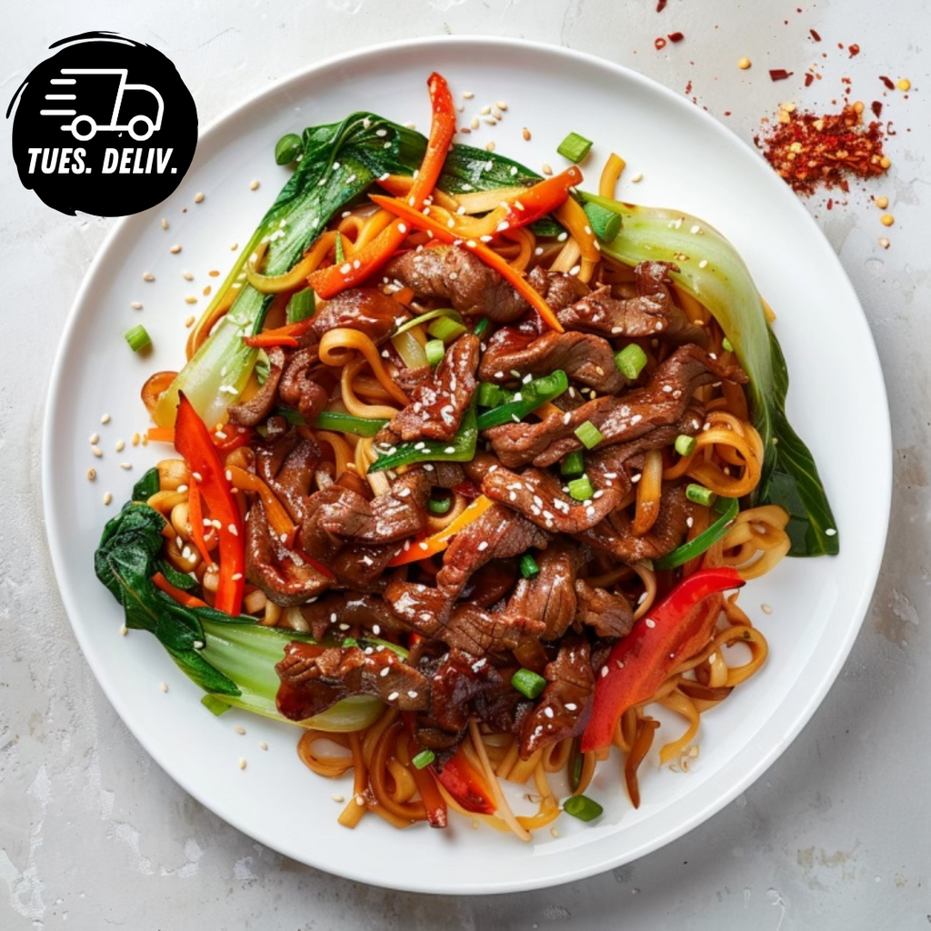 MONGOLIAN BEEF STIR FRY WITH EGG NOODLES AND VEG.