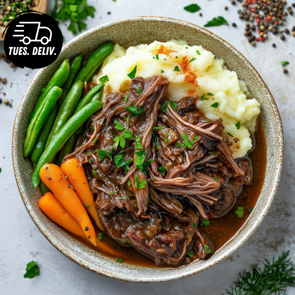 SLOW COOKED BEEF WITH MASH POTATO AND ONION GRAVY.